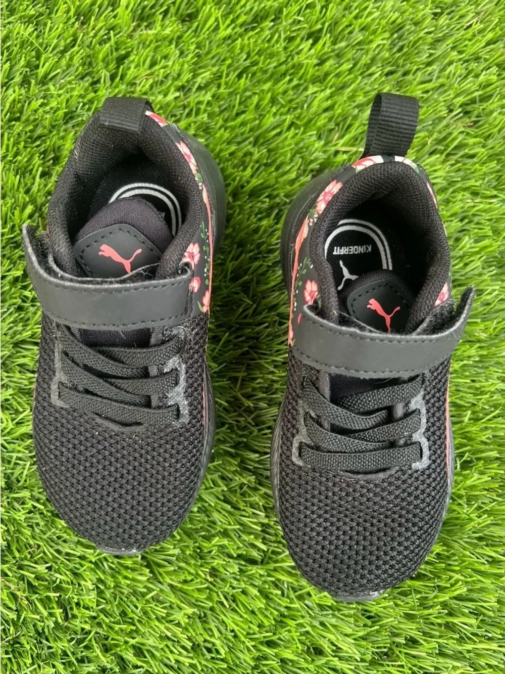 Puma Kids Black Sneakers with Pink Floral Accent